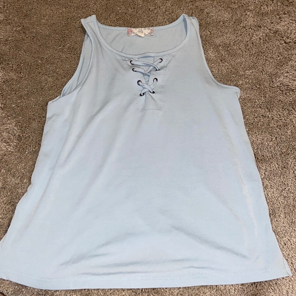 Blue tank, cross strings in front